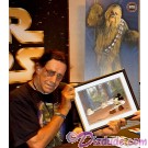Peter Mayhew holding the Disney STAR WARS: "Return of the Jedi" Black Framed JEDI MICKEY in "Defend-Ears of the Kingdom" hand painted Cel just after he autographed the back ~ © Dizdude.com